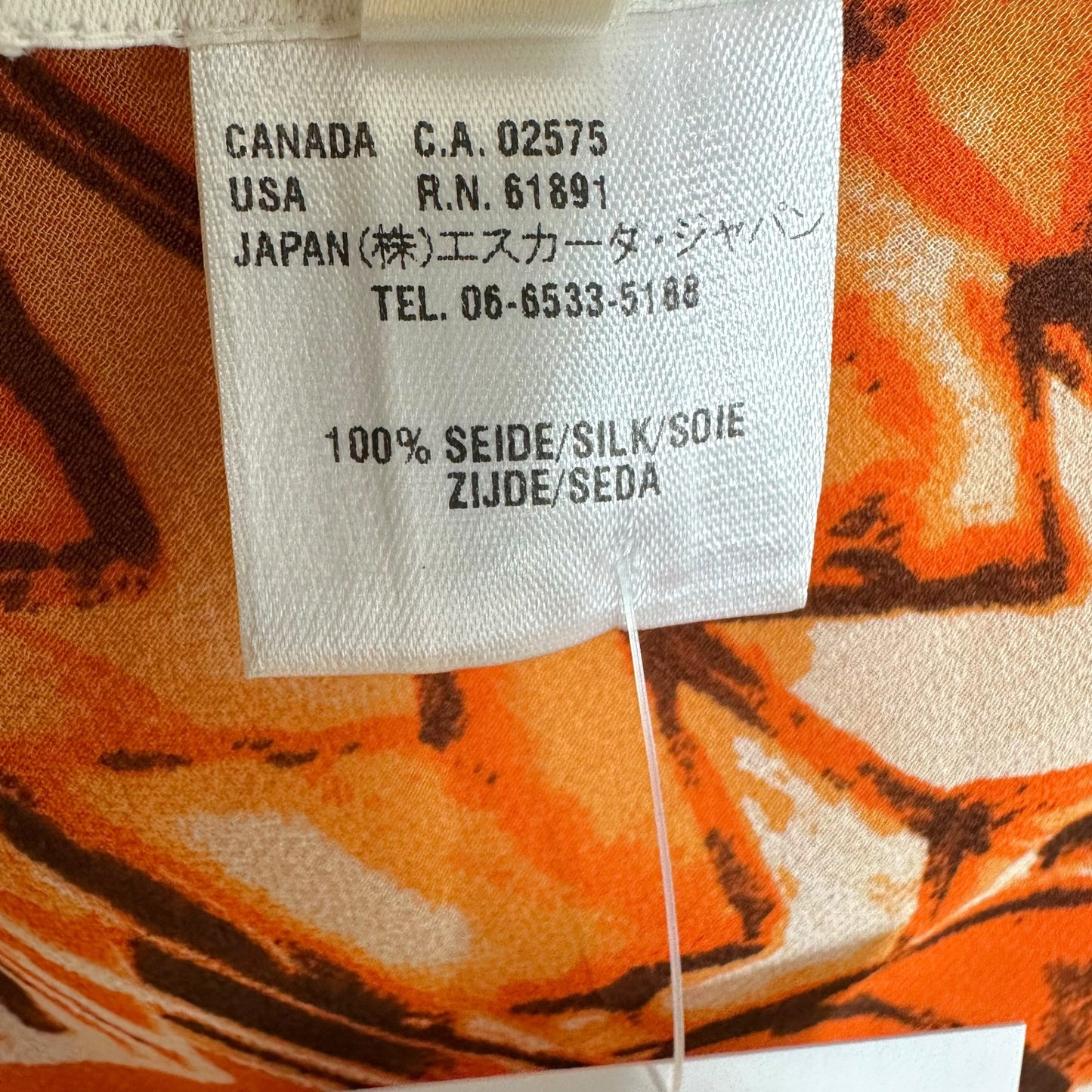 Escada Orange Abstract Print Silk Midi Skirt - Outfit Repeater