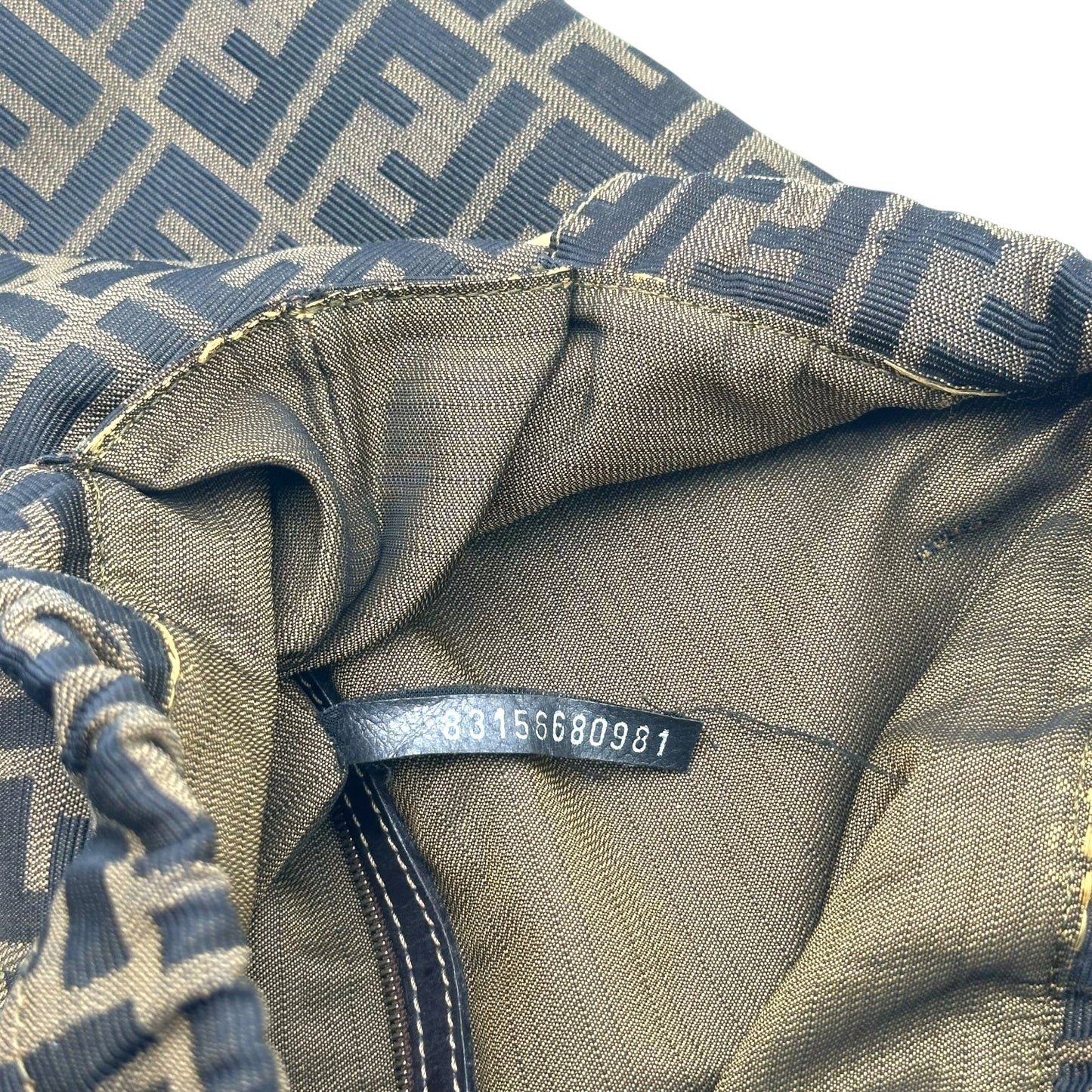 Fendi Zucca Monogram Ring Handle Clutch Bag - Outfit Repeater