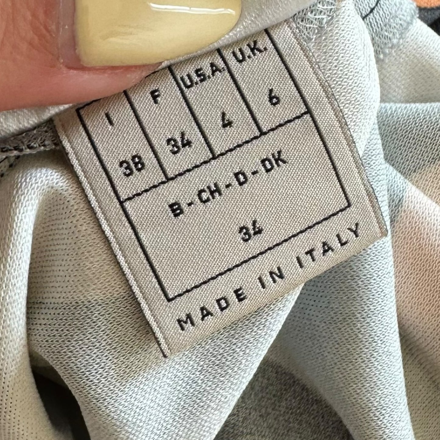 Emilio Pucci Orange & Black Printed Asymmetrical Long Sleeve Top - Outfit Repeater