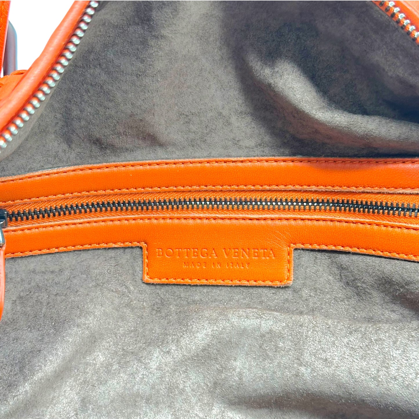 Bottega Veneta Orange Intrecciato Leather East West Bag
