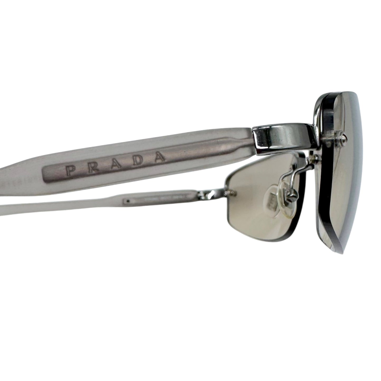 Prada 59017 Silver Rimless Sunglasses