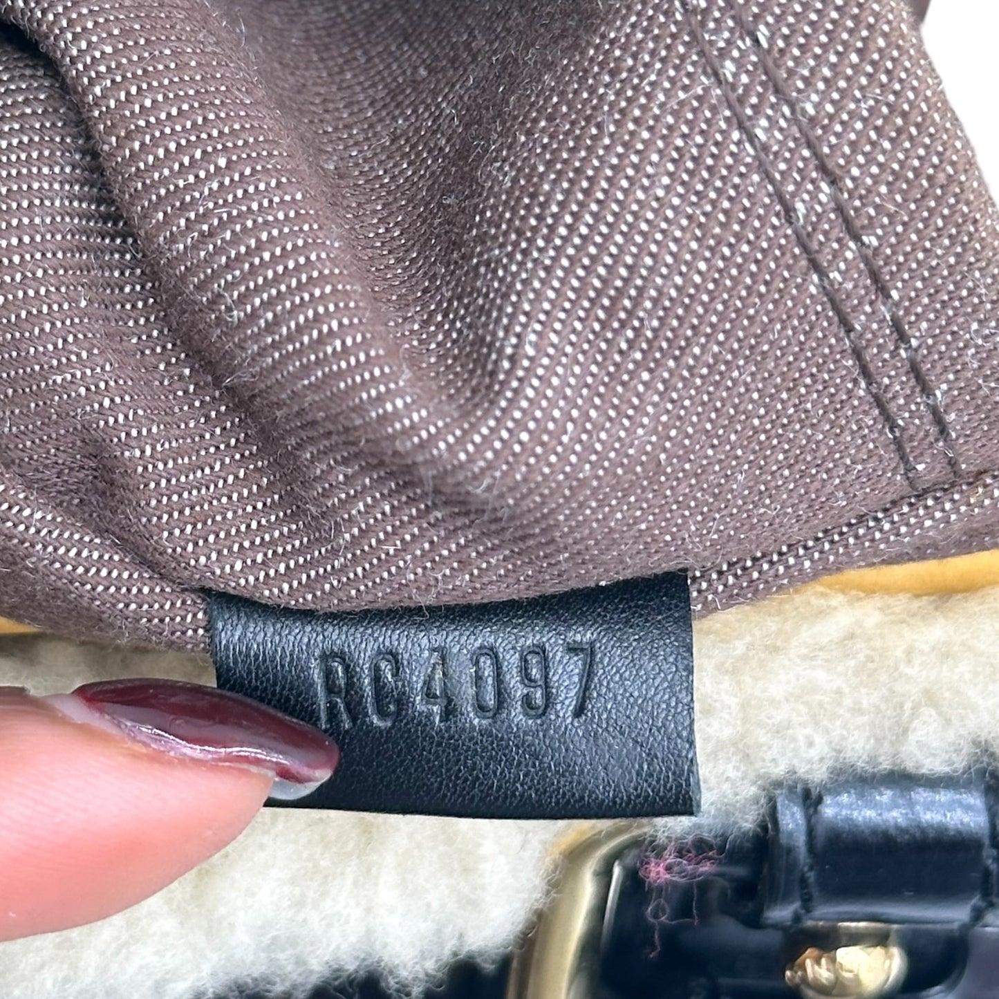 Louis Vuitton Shearling Monogram Storm Handbag