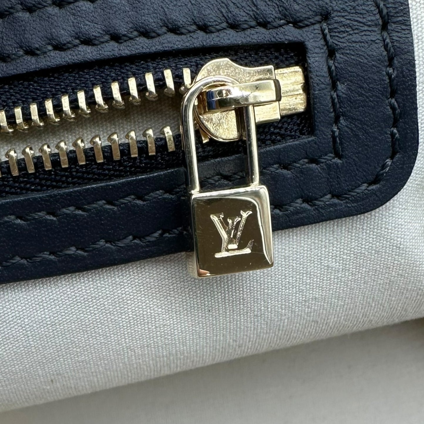 Louis Vuitton Navy Blue Lin Monogram East West Alma Bag - Outfit Repeater