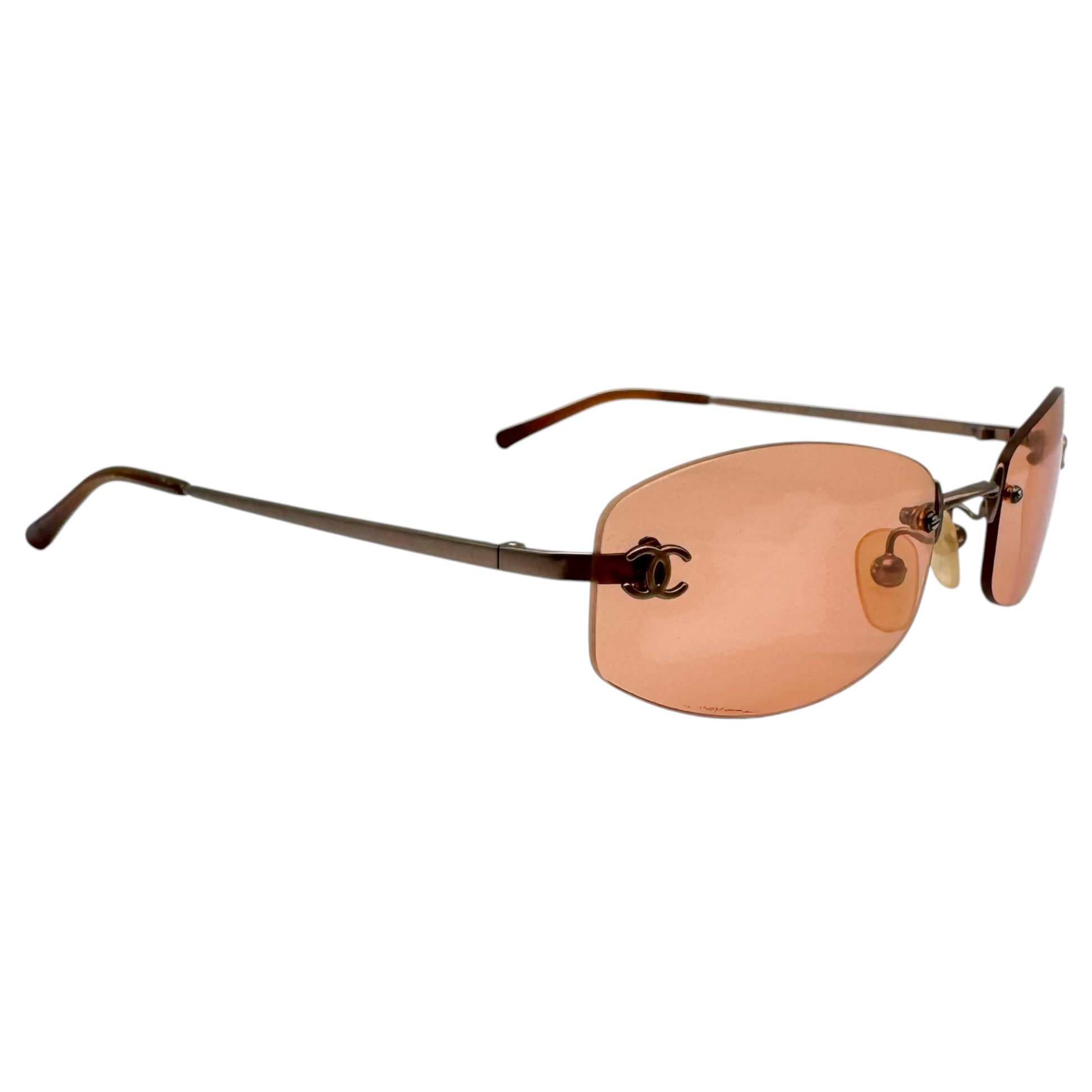 Chanel Rimless Oval Sunglasses Orange Silver Logo