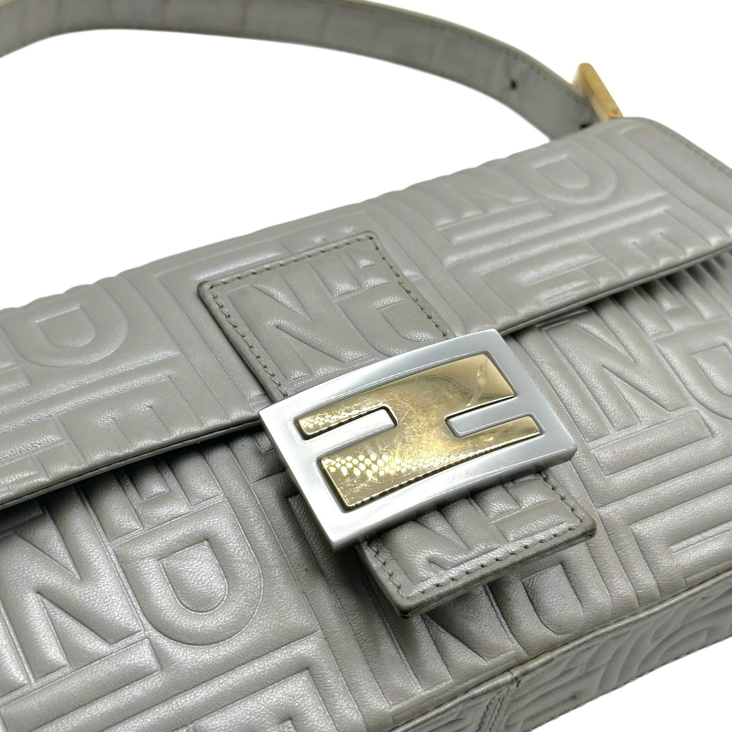 Fendi Silver Logo Embossed & Gold Hardware Baguette Bag