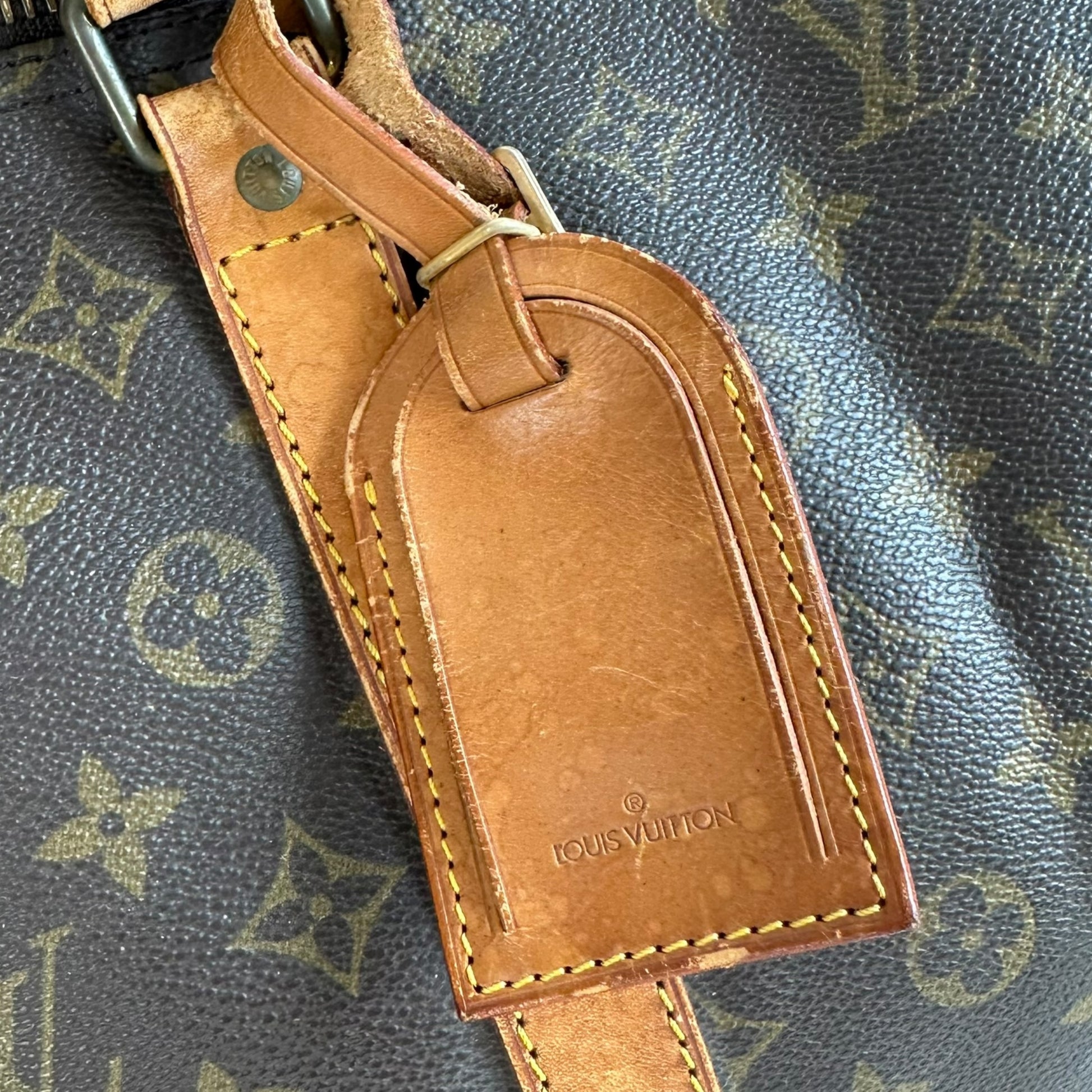 Louis Vuitton Monogram Bandouliere 55 Duffle Bag - Outfit Repeater