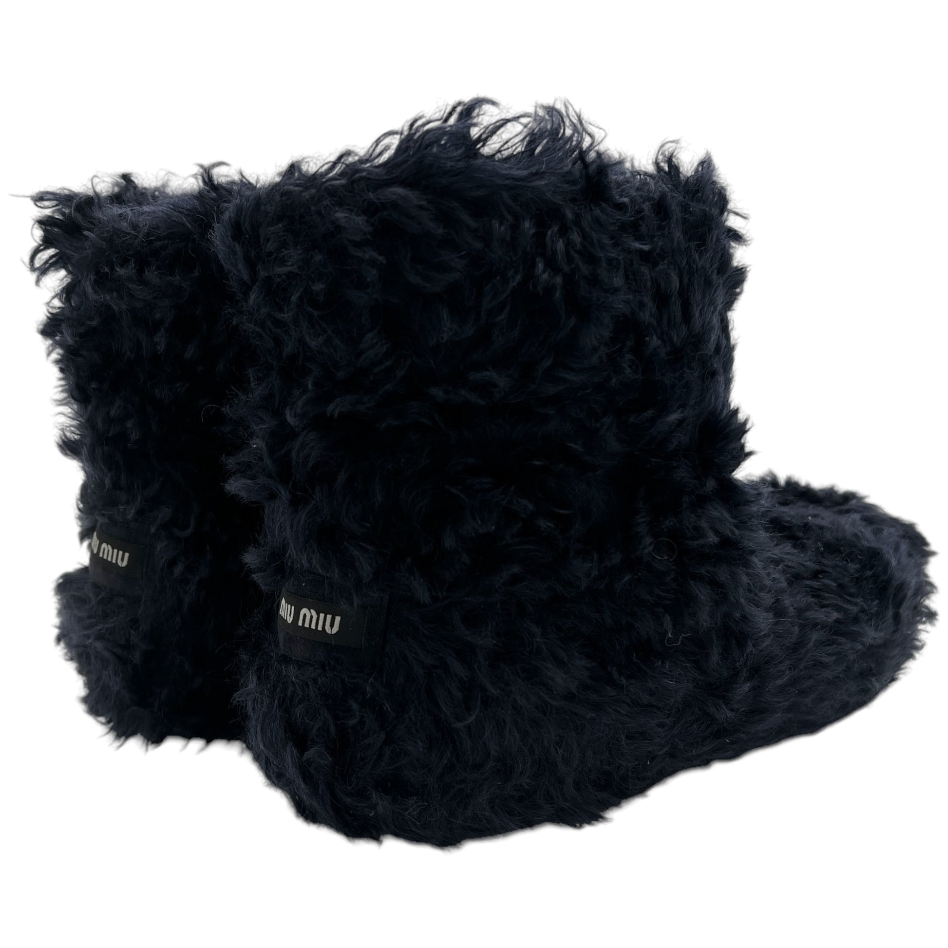 Miu Miu Black Shearling Boots - Outfit Repeater