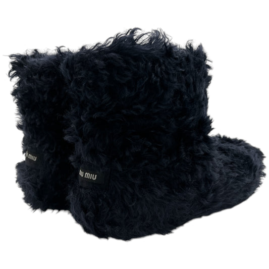 Miu Miu Black Shearling Boots - Outfit Repeater