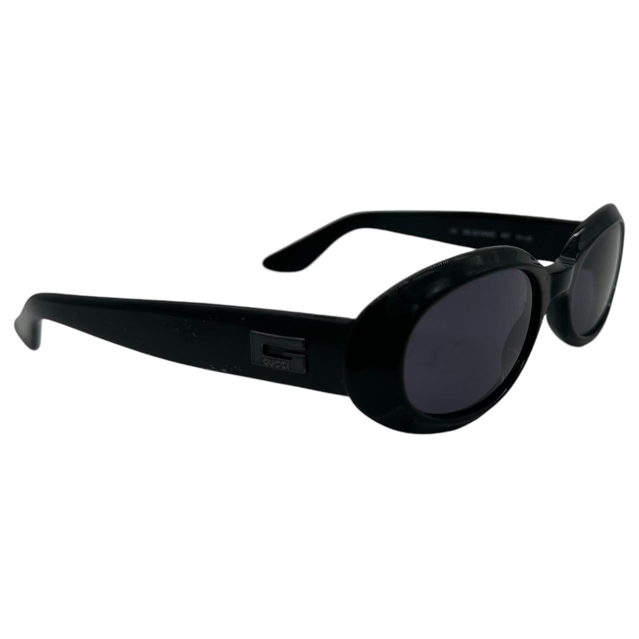 Gucci Black Oval Sunglasses with Dark Tinted Lenses