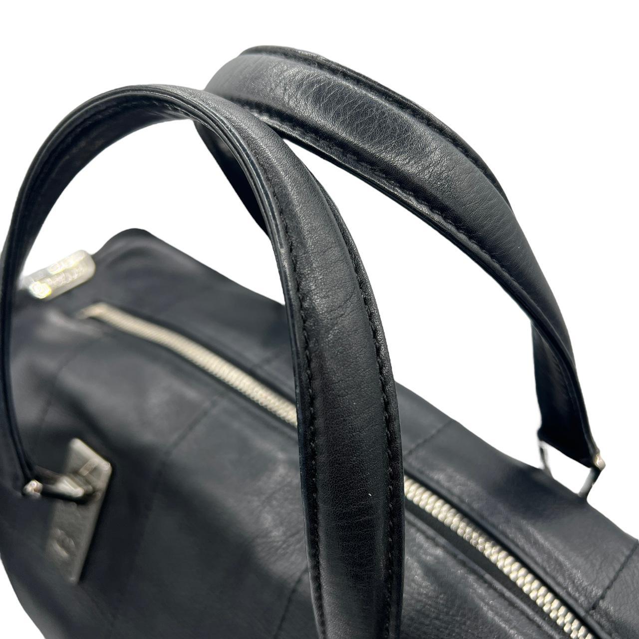 Chanel Black Chocolate Bar Quilted Leather Boston Bag - Outfit Repeater