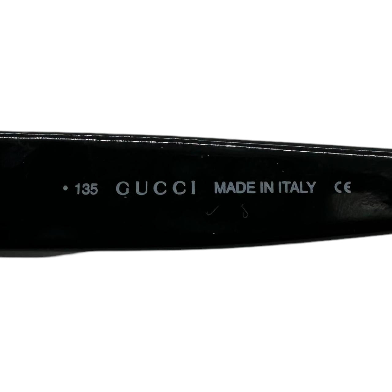 Gucci Black Oval Sunglasses with Dark Tinted Lenses