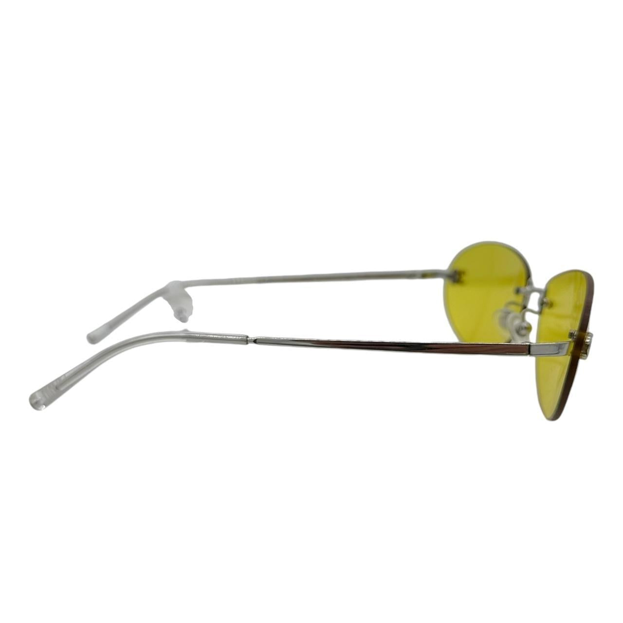 Chanel Rimless Sunglasses Yellow Tinted Lenses Silver Hardware
