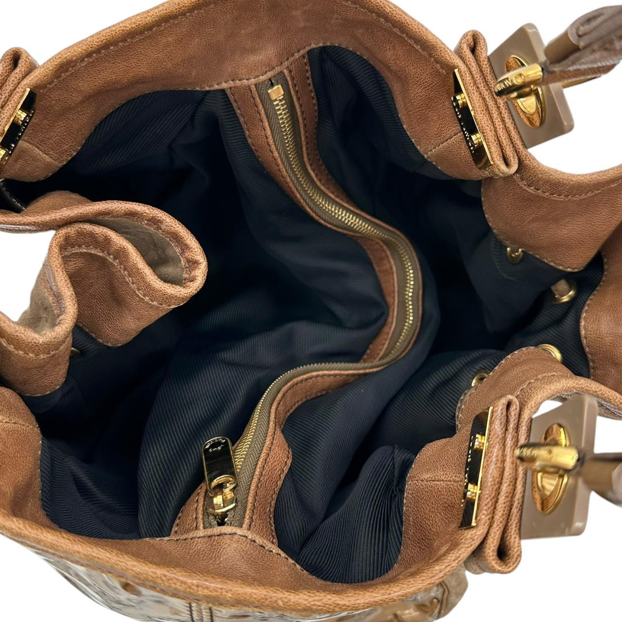 Louis Vuitton Irene Logo Embossed Shoulder Bag - Outfit Repeater