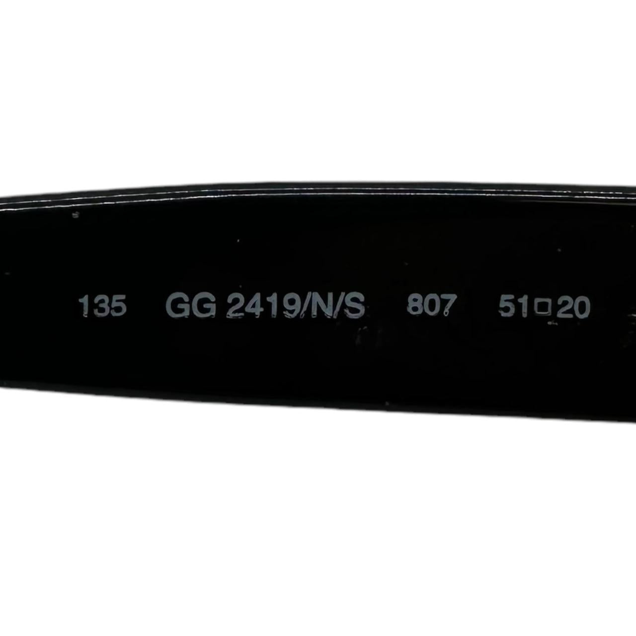 Gucci Black Oval Sunglasses with Dark Tinted Lenses