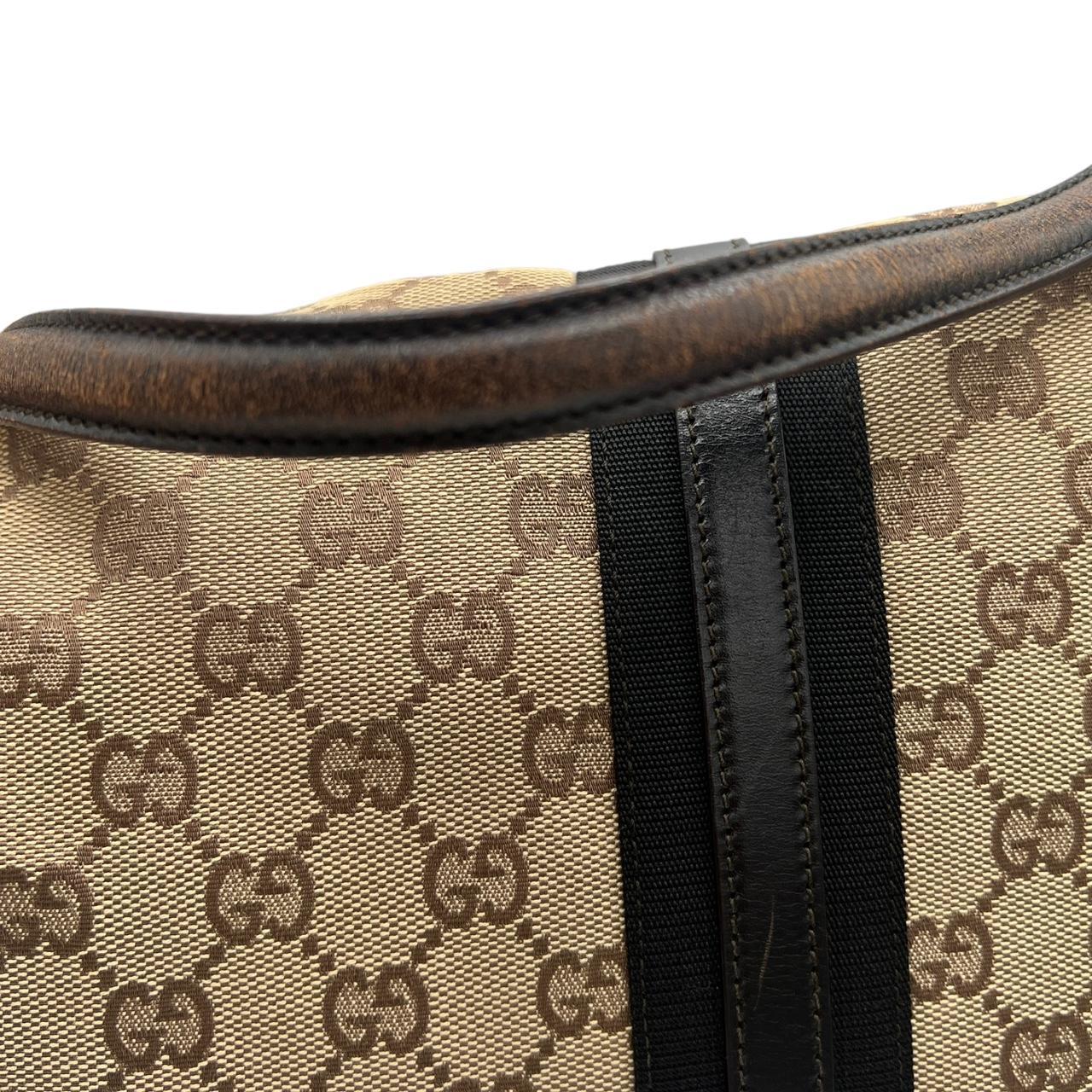 Gucci Brown Leather Monogram Fold Over Shoulder Bag