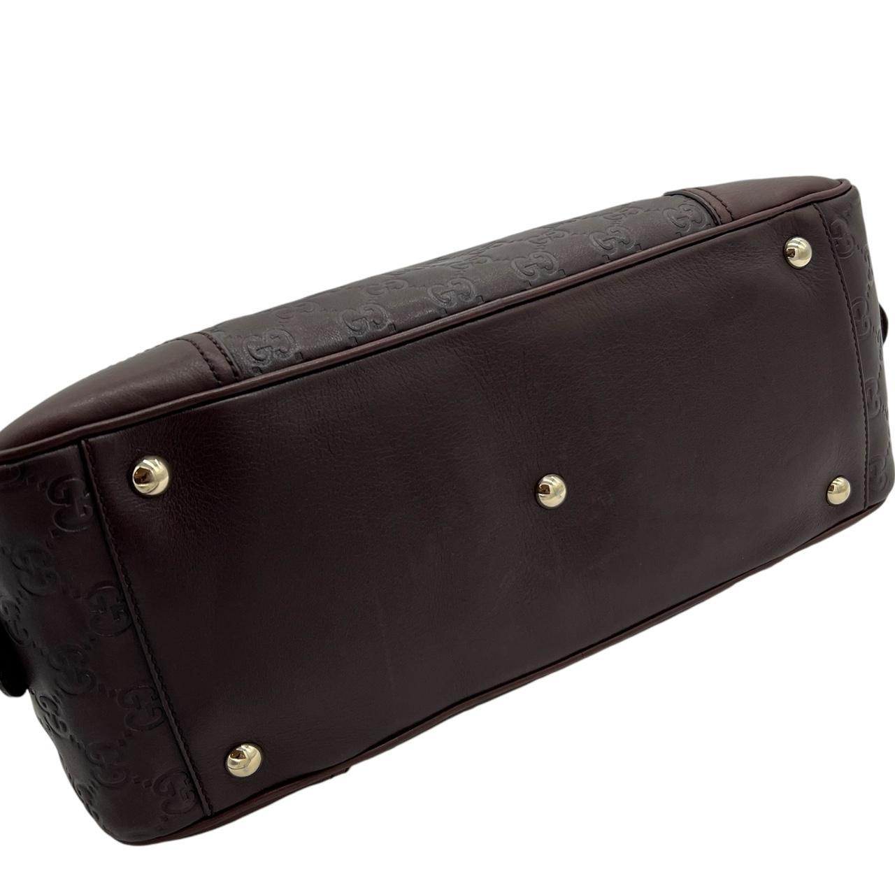 Gucci Brown Leather Boston Bag with Embossed Monogram